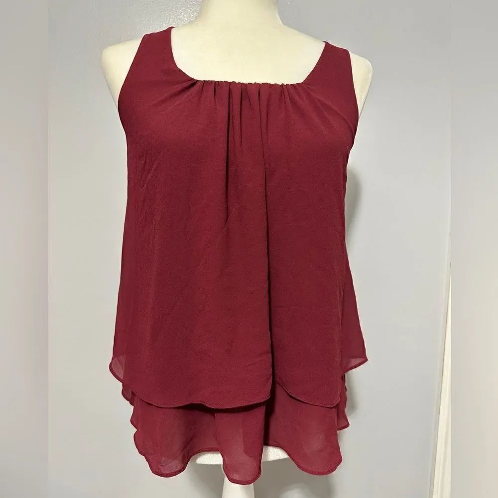 Naked Zebra garnet top with back ruffle size S